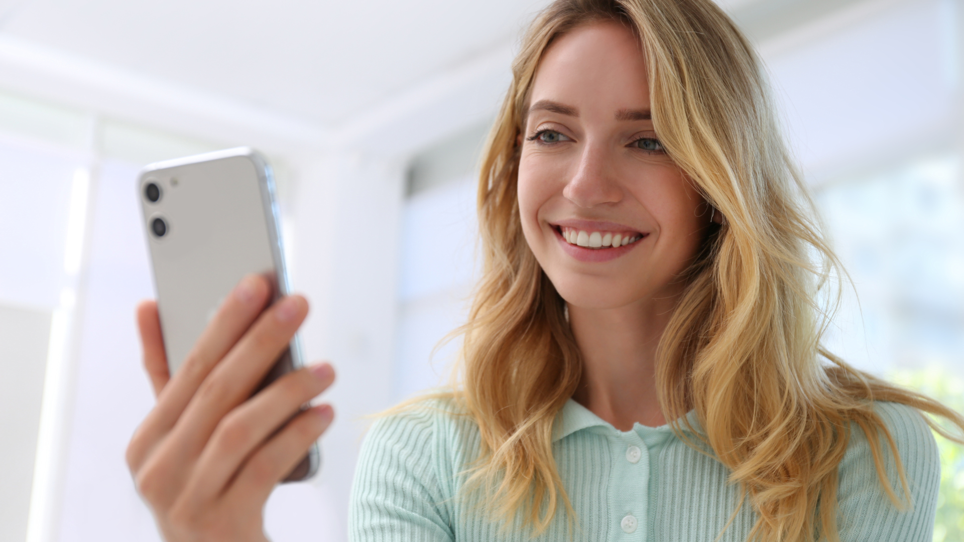 Woman holding a mobile phone